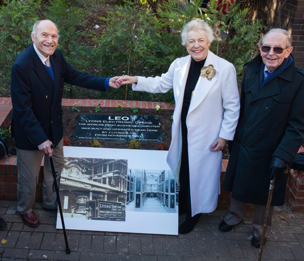 Tony Morgan shows the yet-to-be-unveiled stone to Mike Tyzack. Gloria Guy, Hilary Caminer and Peter Byford in attendance.